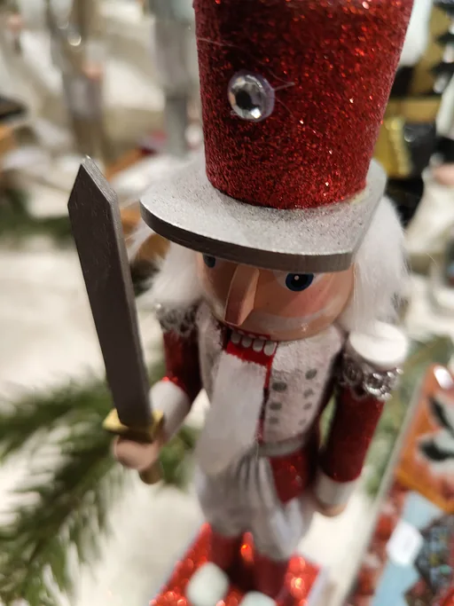 A carved wooden nutcracker on a Strasbourg market stall