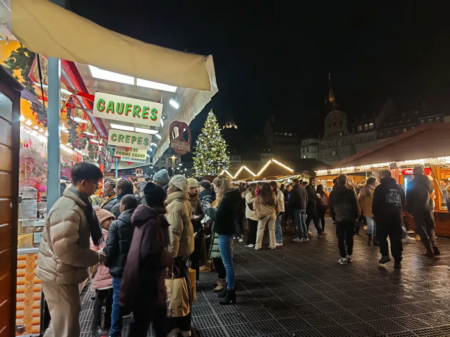 Wooden chalets and crowds at the Strasbourg Christmas market